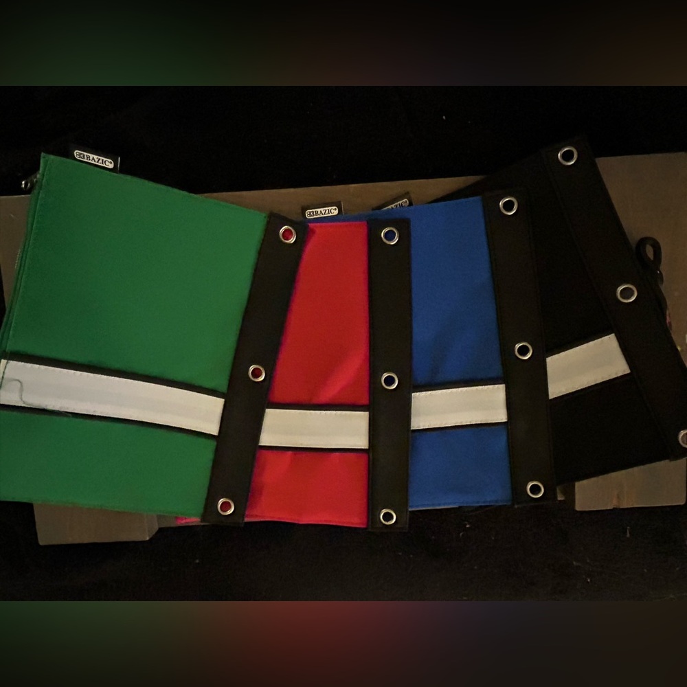 Colorful pencil cases with binder holes